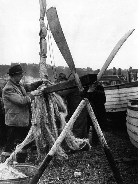 Drying fishing nets at Hastings, Sussex