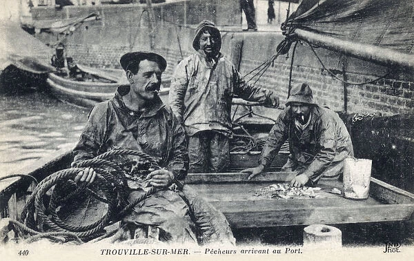 Fisherman arriving into port - Trouville-sur-Mer, France
