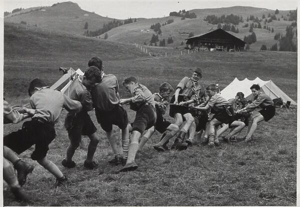 French scouts playing tug of war at camp in Switzerland