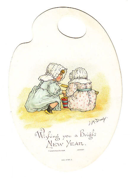 Two girls at the seaside on a palette-shaped New Year card
