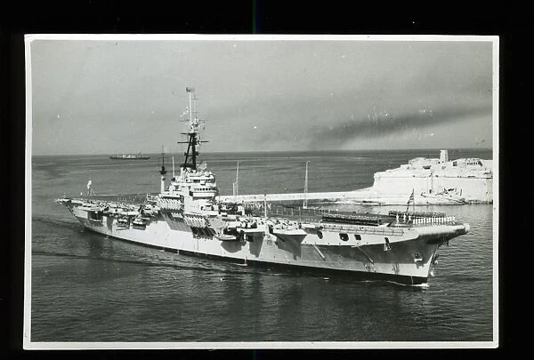 HMS Glory, Colussus Class aircraft carrier entering the Grand Harbour in