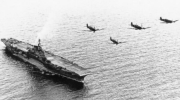 HMS Indomitable and Supermarine Seafires probably 1940s