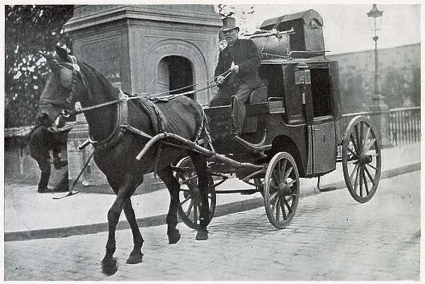 A horse drawn cab in the streets of Paris. Date: 1903