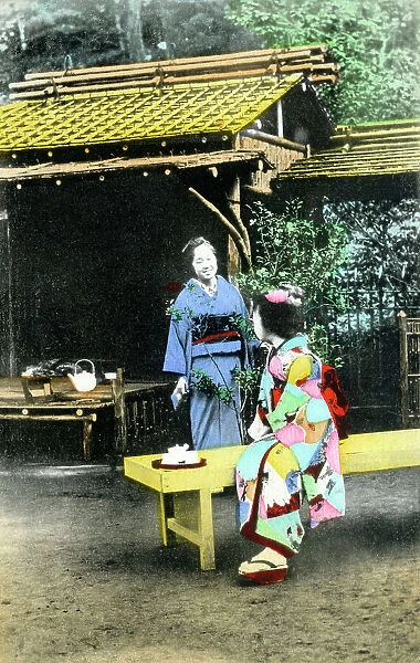 Two Japanese women taking tea