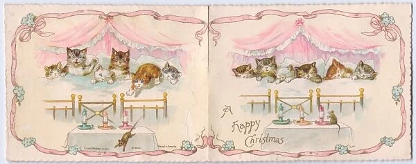 Six kittens in bed on a Christmas card