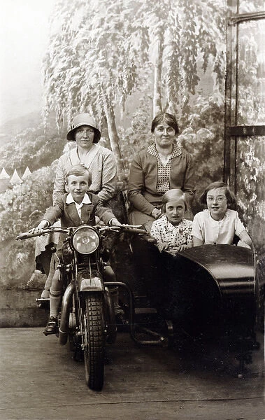 Ladies and children on a 1929 Coventry Eagle motorcycle & si