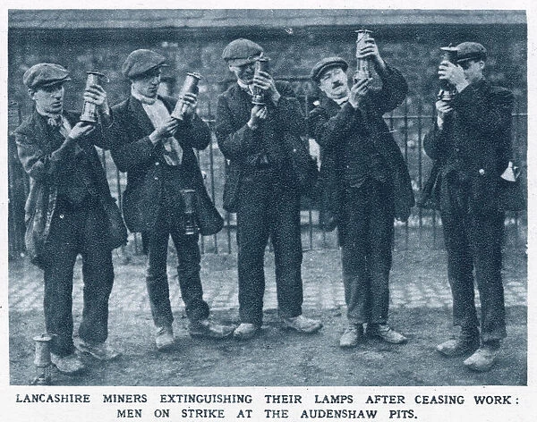 Lancashire miners extinguishing their lamps after ceasing work