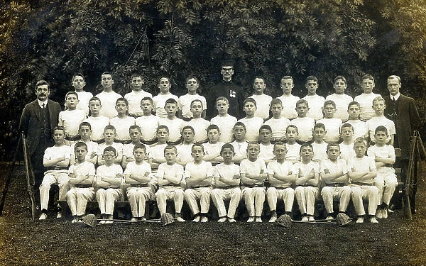 A large group of young boys at a military school - Lacrosse