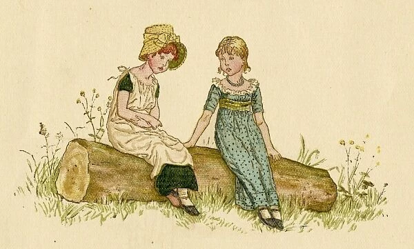 Two little girls sitting on a log