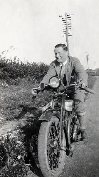 Man on 1926 Triumph motorcycle