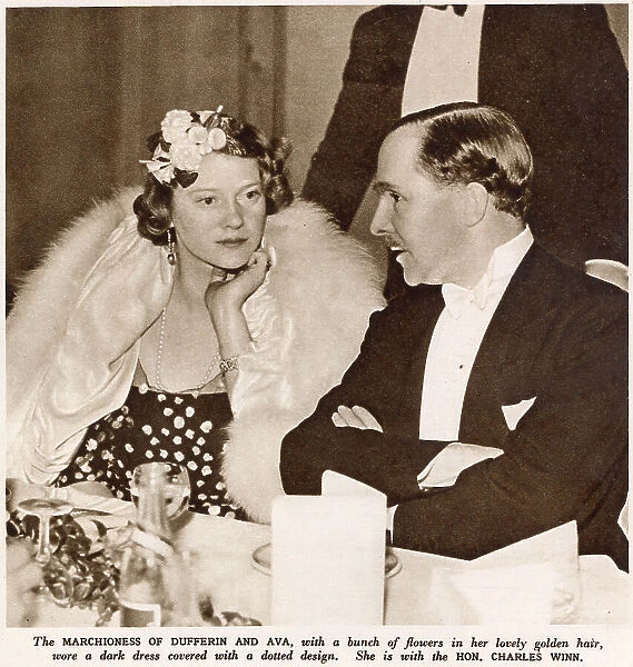 Marchioness of Dufferin and Ava talking the the Hon. Charles Winn at the Primrose League Ball. Date: 1936