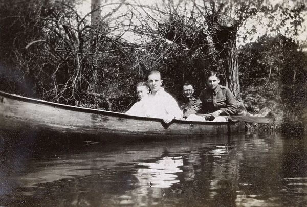Four men in a rowing boat, Oxford, WW1