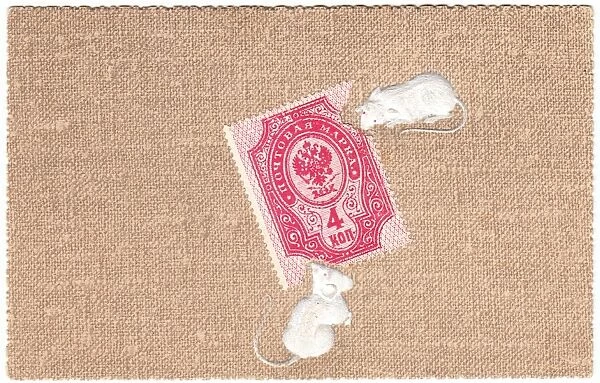 Two mice eating a Russian stamp on a postcard