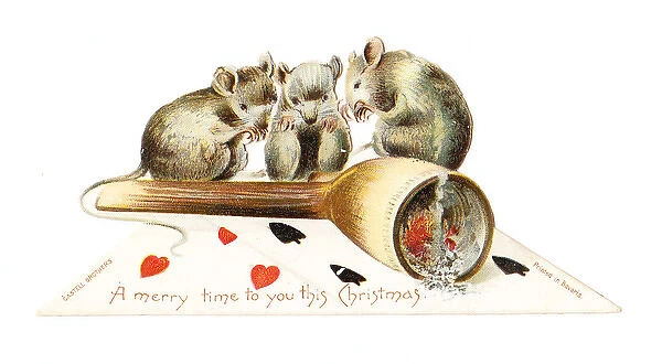 Three mice and a pipe on a cutout Christmas card