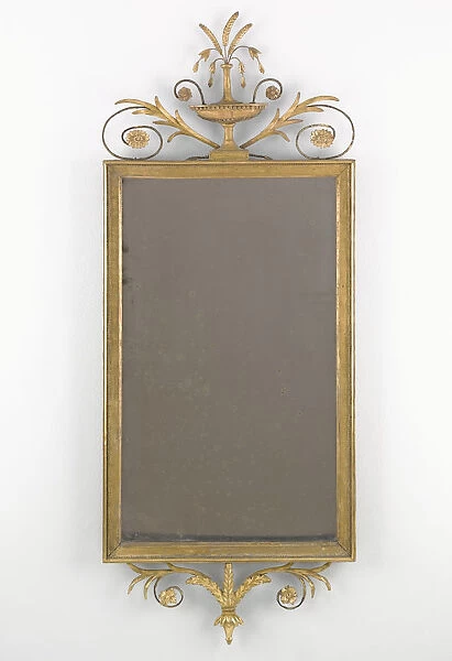 Mirror. Gilt carved wood and gesso pier glass surmounted by a vase