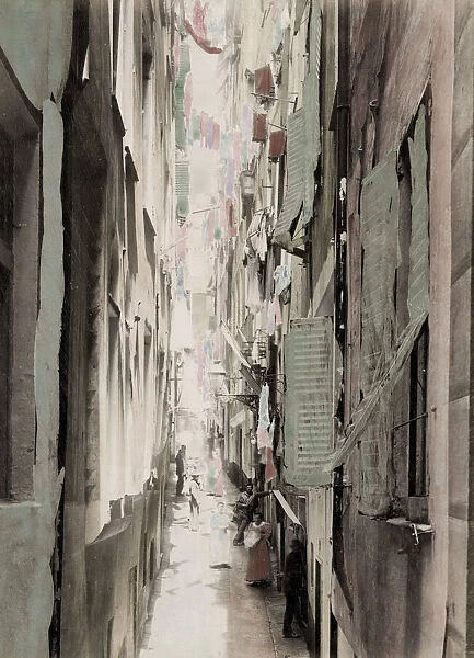 Narrow street, washing hanging upper windows, Italy
