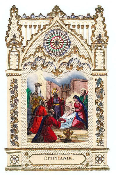 Nativity scene on a paper lace Christmas card