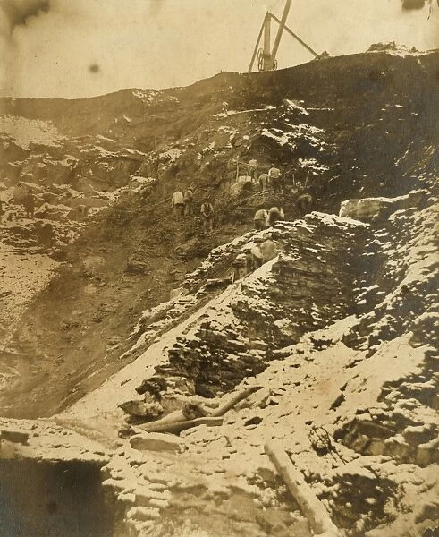 Navvies digging and cutting on an embankment