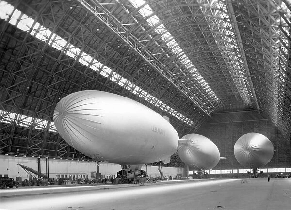 Three US Navy Goodyear K-Series airships in a hangar