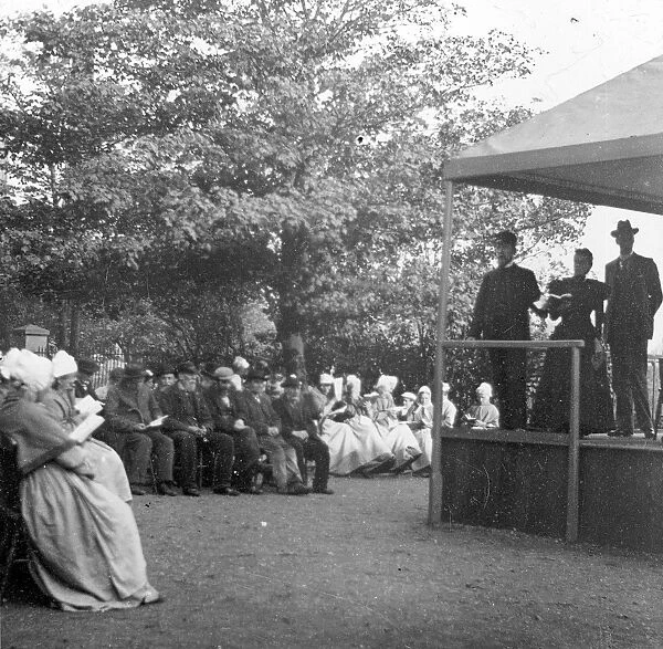 Open air church service at a workhouse