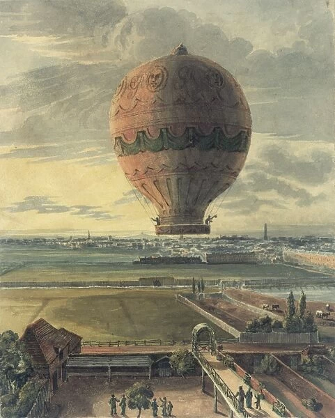 Ornately decorated balloon in flight