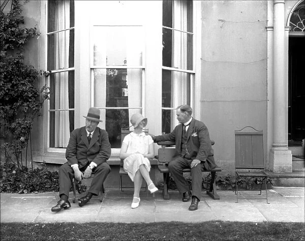 Three people on a Devon terrace