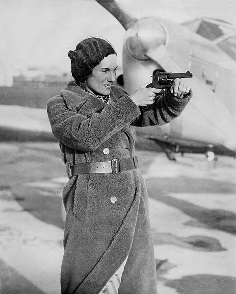 A Picture of Jean Batten with a Hand-Gun