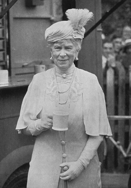 Queen Mary drinking tea