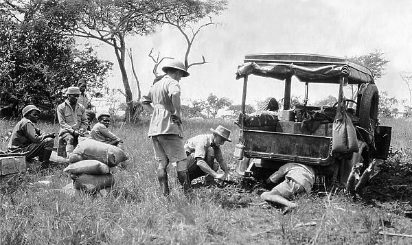 Repairs to a vehicle while on safari, Africa