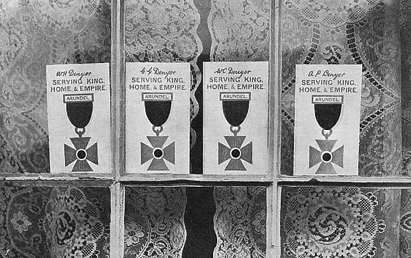 Service cards in a window in Arundel, WW1