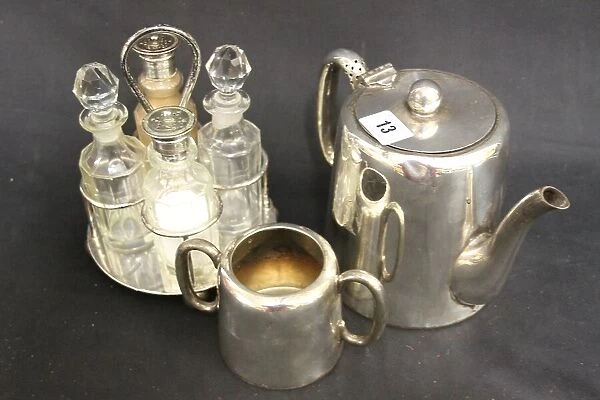 Silver plated cruet, teapot and sugar bowl