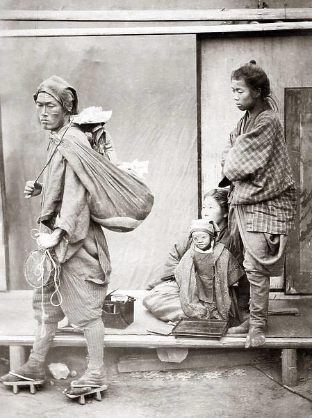 Street entertainers with monkey, Japan, 1870s