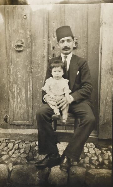 Turkish man and his young daughter