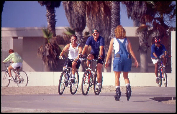 USA - Cyclists and skaters Venice Beach California