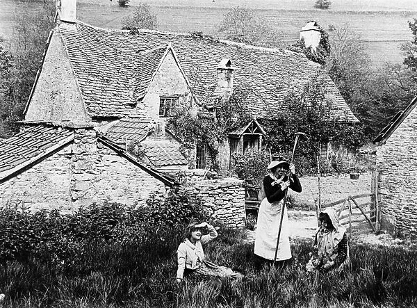 Villagers outside stone cottages, 1890s