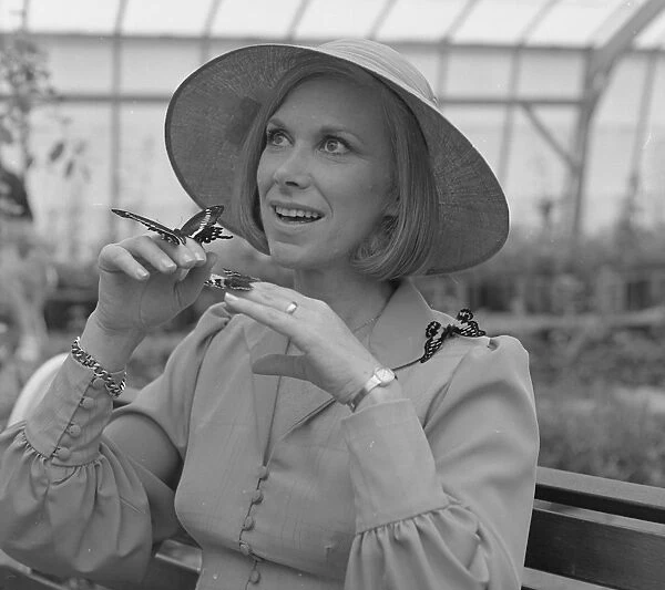 Wendy Craig, English actress, with butterflies