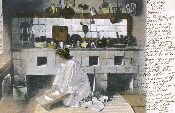 Woman at work in a kitchen, Mexico