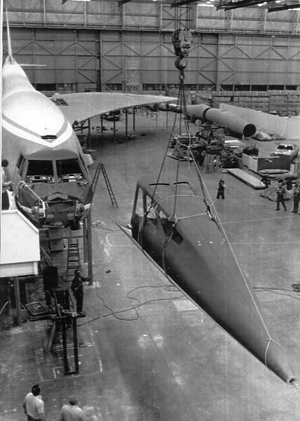 Workmen begin the job of dismantling the Boeing mock-up