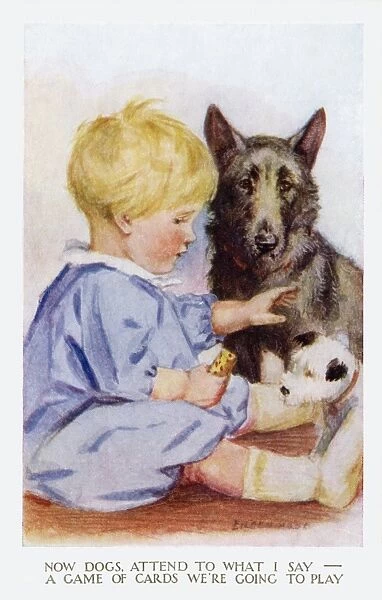 Young boy with pet dogs