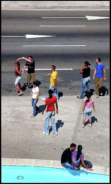 Young Cubans dancing in the street