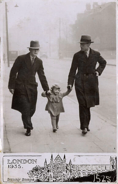 Young girl out for stroll with Father & Grandfather, London