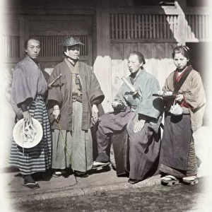 1860s Japan - portrait of a samurai group being served by a tea house servant Felice or