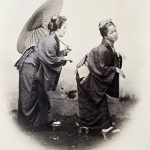1860s Japan - portrait of a two young women in the pose of the Grecian Bend Felice or