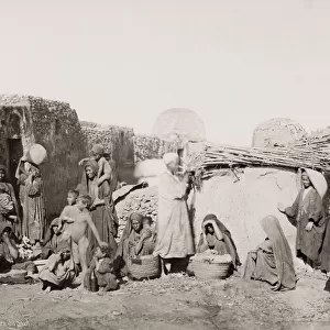 19th century vintage photograph: indigenous group, southern Egypt, women and children, c