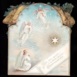 Angels and star on a cutout Christmas card
