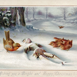 Birds with wooden doll in snow on a Christmas card