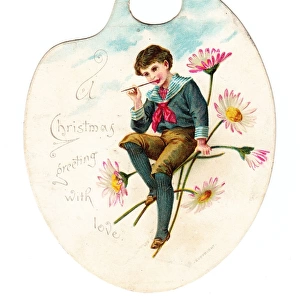 Boy with daisies on a palette-shaped Christmas card