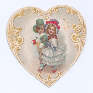 Boy and girl on a heart-shaped Valentines card