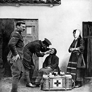 A British doctor attending to a Macedonian villager