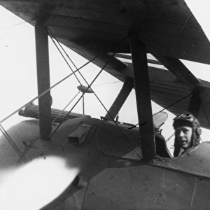 British pilot in his biplane, WW1